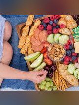 A platter of assorted snacks and fruits